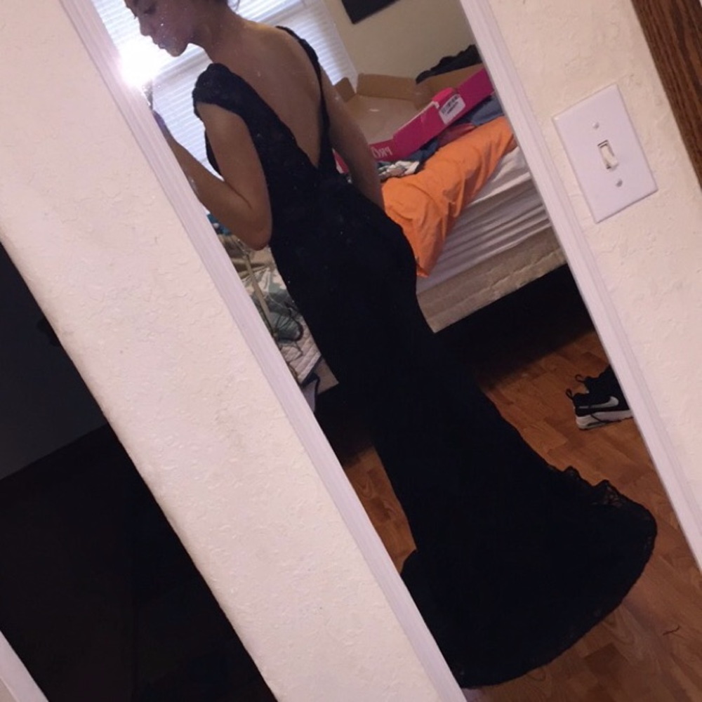 Long formal off the shoulder lace dress. Mori Lee